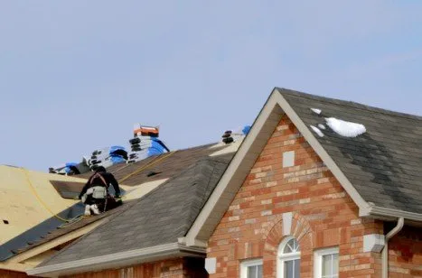 Slide of Top Gunz Roofing