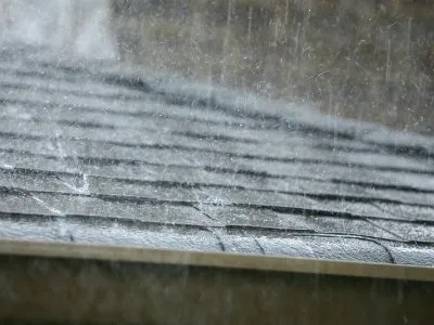 Slide of Top Gunz Roofing