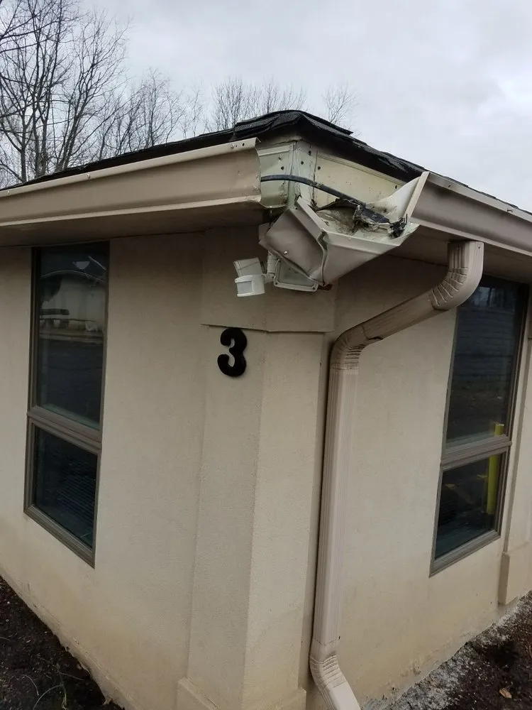 Slide of Top Gutter and Home Improvement Corp