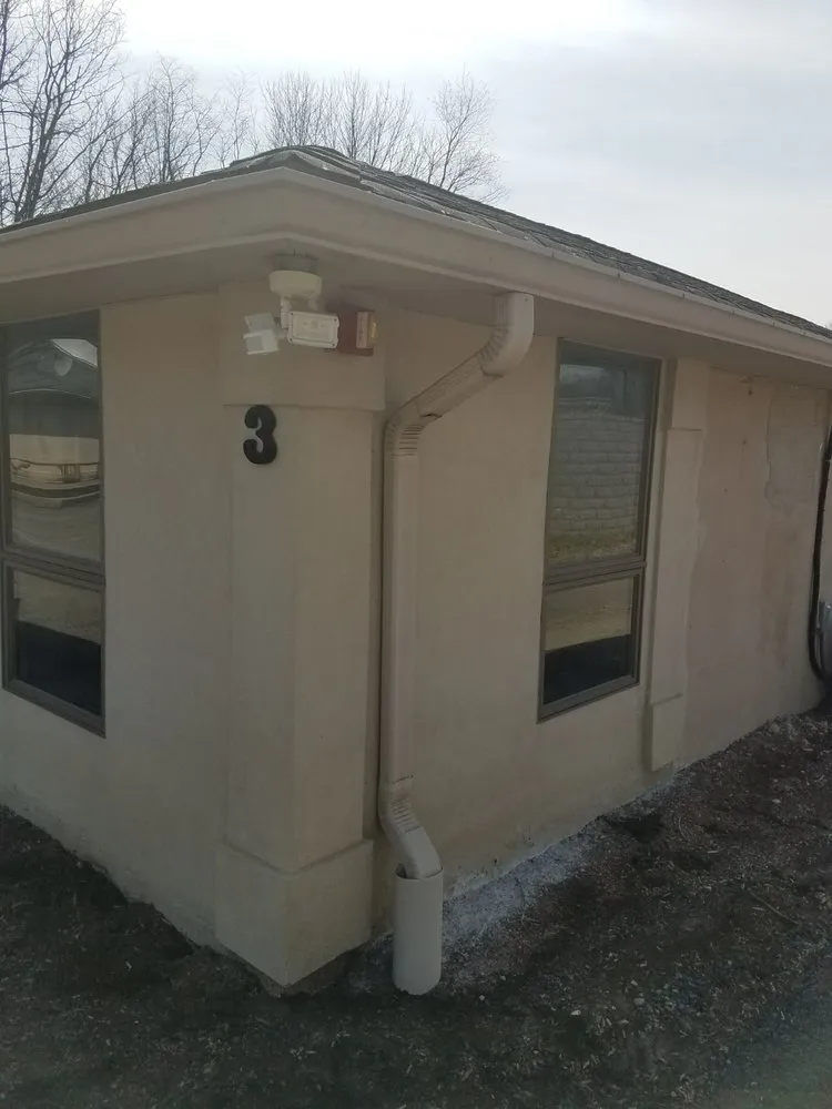 Slide of Top Gutter and Home Improvement Corp