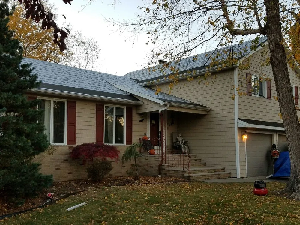 Slide of Top Gutter and Home Improvement Corp