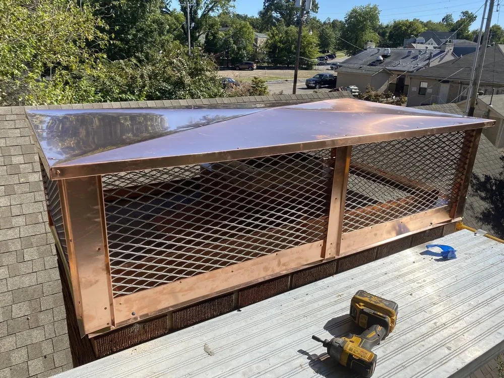 Slide of Top Hat Chimney and Roofing