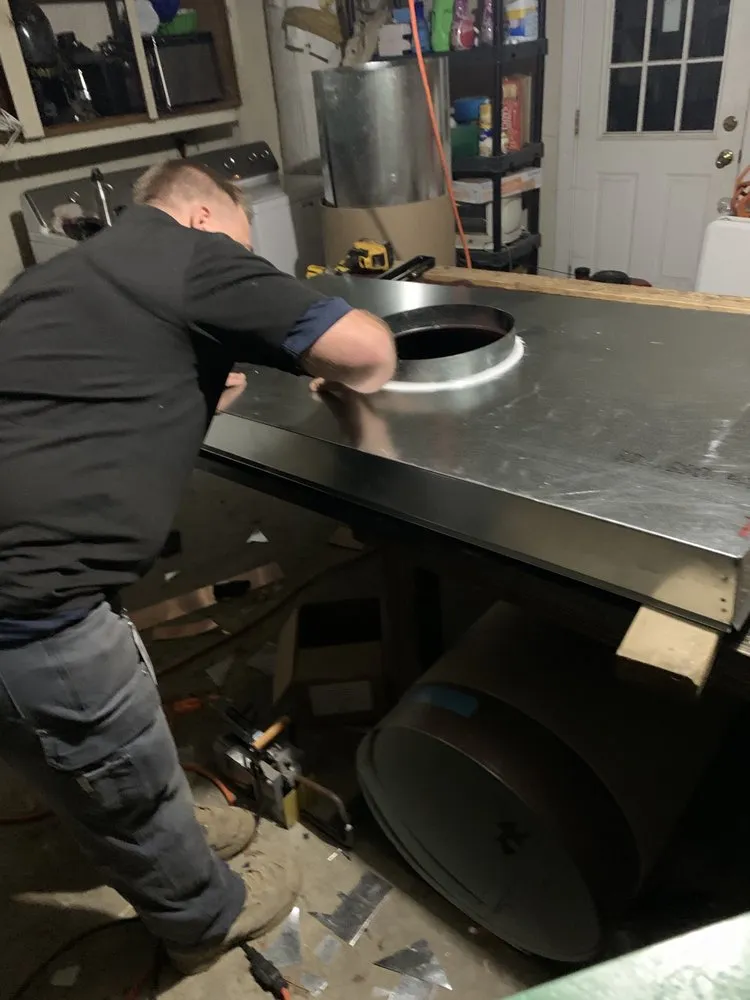 Slide of Top Hat Chimney and Roofing