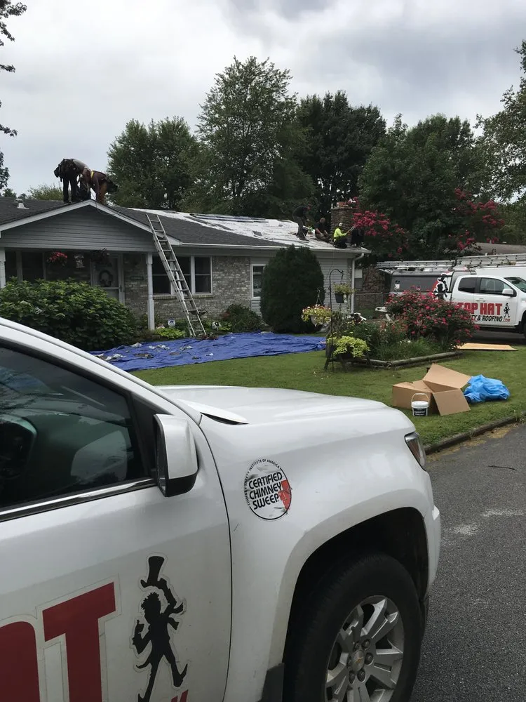 Slide of Top Hat Chimney and Roofing