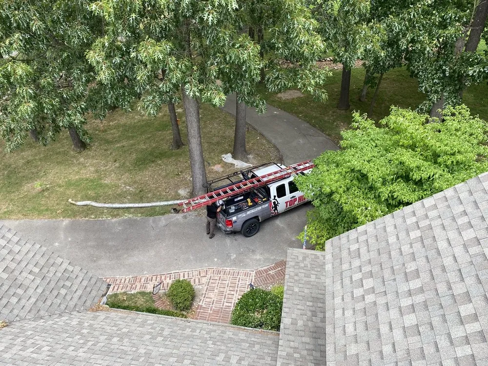 Slide of Top Hat Chimney and Roofing