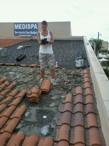 Slide of TOP It Off Roofing