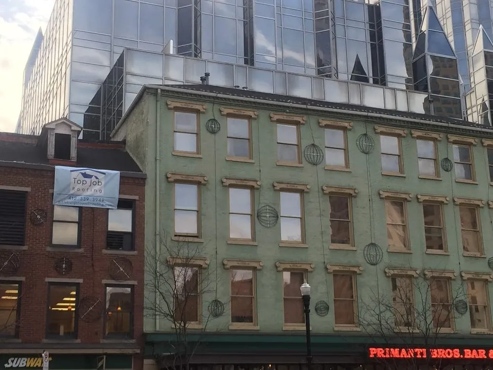 Slide of Top Job Roofing