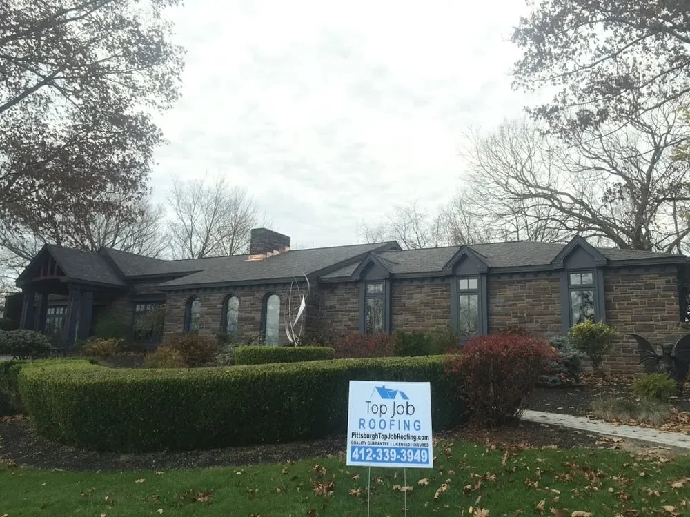 Slide of Top Job Roofing