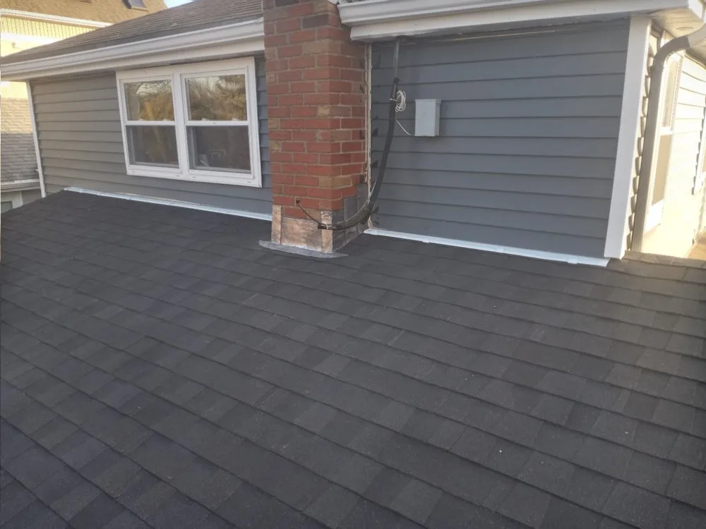 Slide of Top Level Roofing & Remodeling