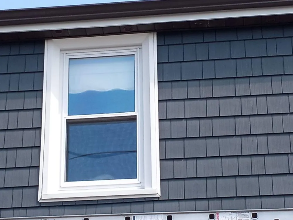 Slide of Top Level Roofing & Remodeling