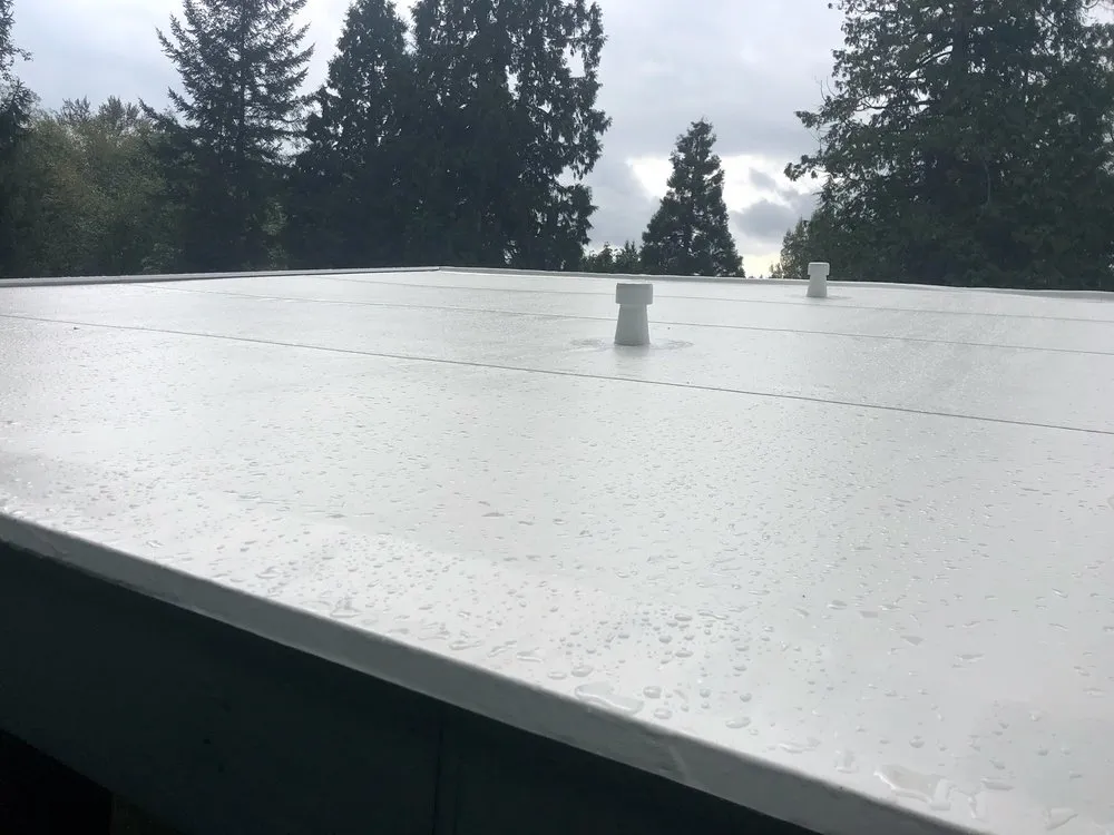 Slide of Top Line Roof & Construction