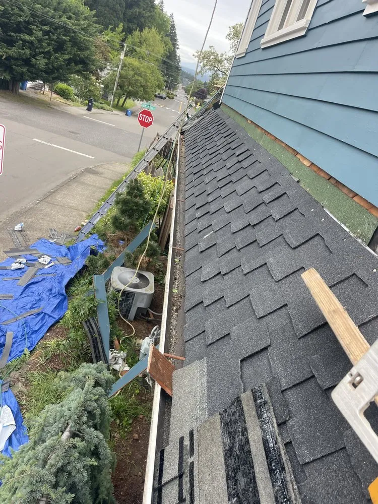 Slide of Top Master Roofing