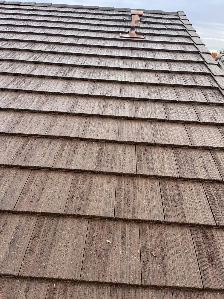 Slide of Top Notch Roof & Gutter Cleaning