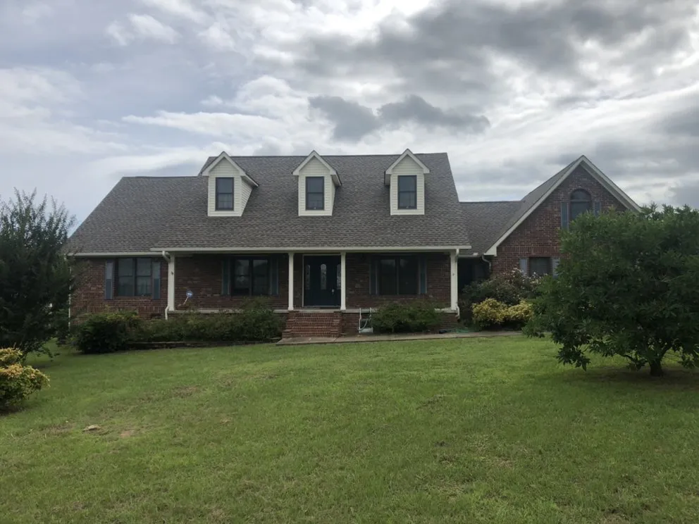 Slide of Top Notch Roofing & Remodeling