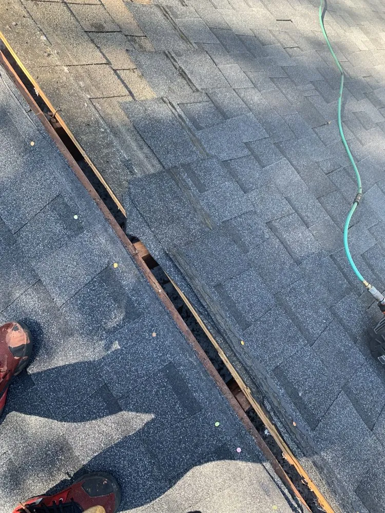 Slide of Top Notch Roofing and Construction