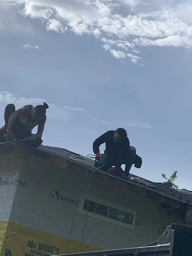 Slide of Top Notch Roofing and Construction