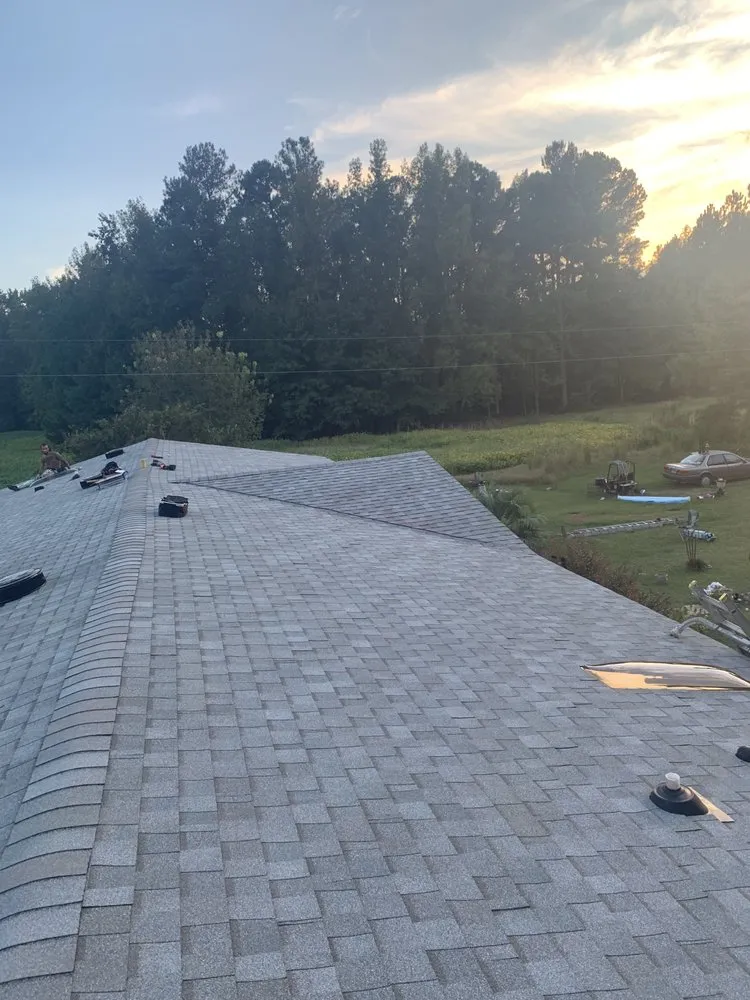 Slide of Top Notch Roofing and Construction