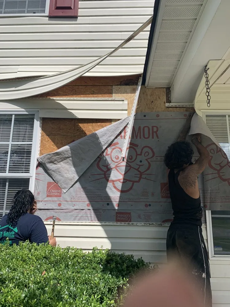 Slide of Top Notch Roofing and Construction