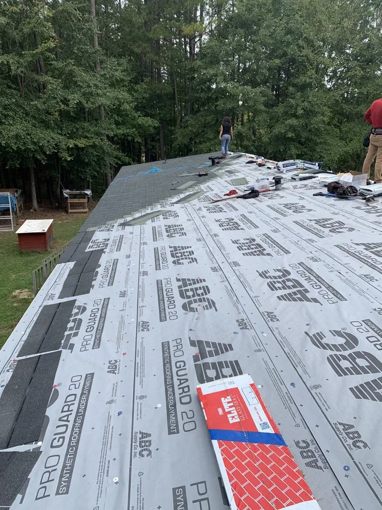 Slide of Top Notch Roofing and Construction