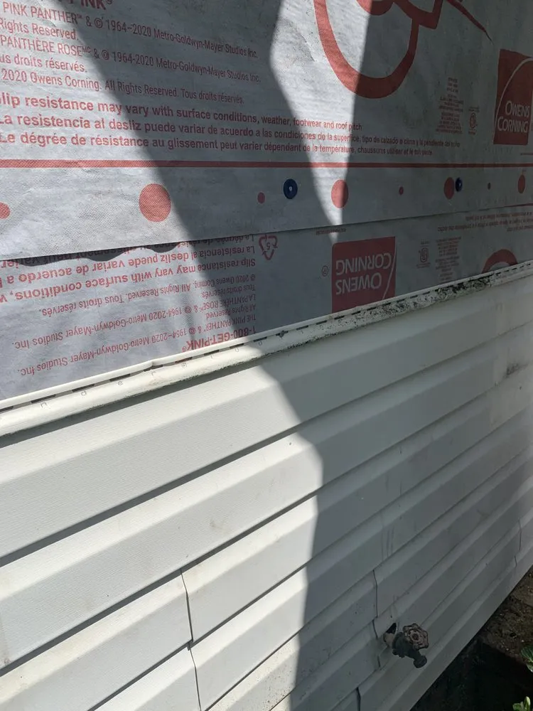 Slide of Top Notch Roofing and Construction