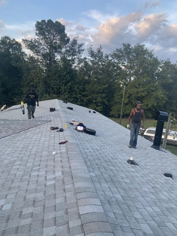 Slide of Top Notch Roofing and Construction