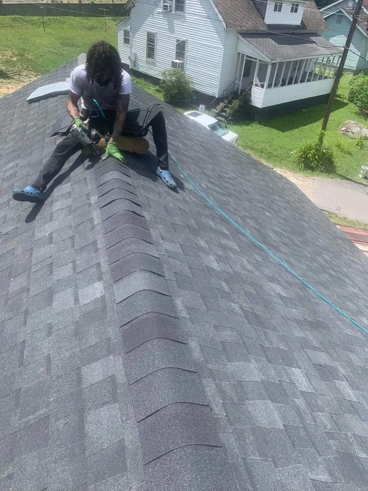 Slide of Top Notch Roofing and Construction