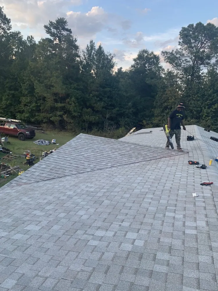 Slide of Top Notch Roofing and Construction