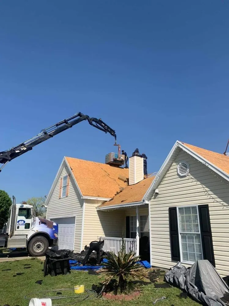 Slide of Top Notch Roofing and Construction