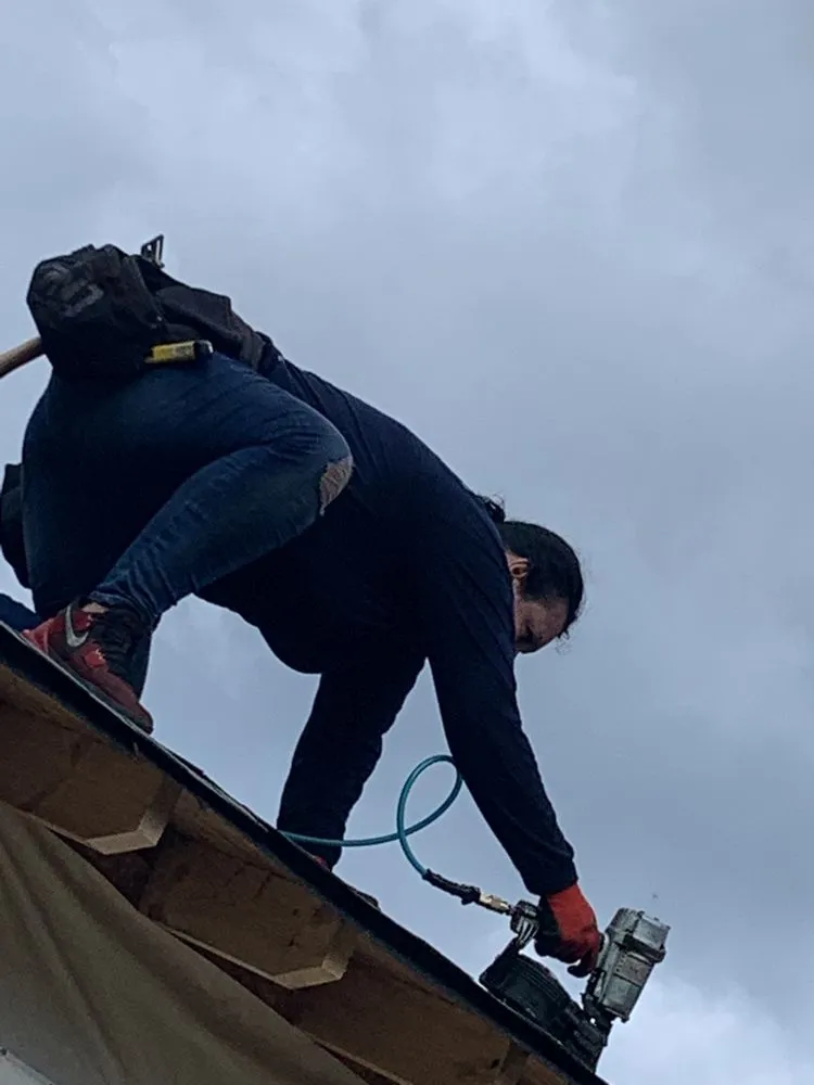 Slide of Top Notch Roofing and Construction