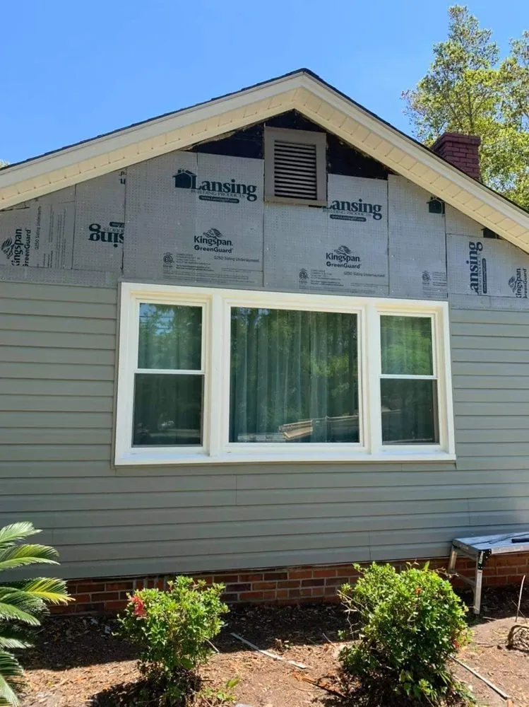 Slide of Top Notch Roofing and Construction