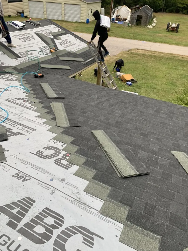 Slide of Top Notch Roofing and Construction