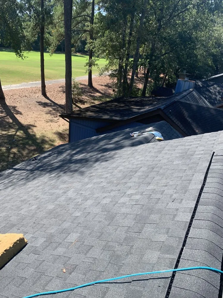 Slide of Top Notch Roofing and Construction