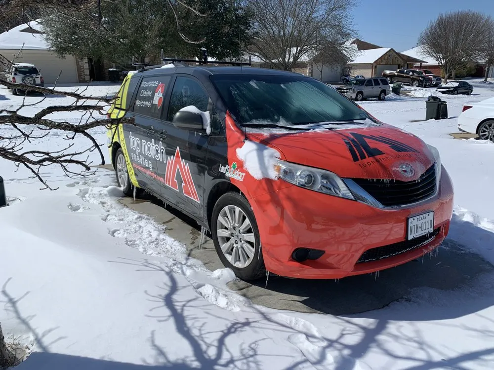 Slide of Top Notch Roofing