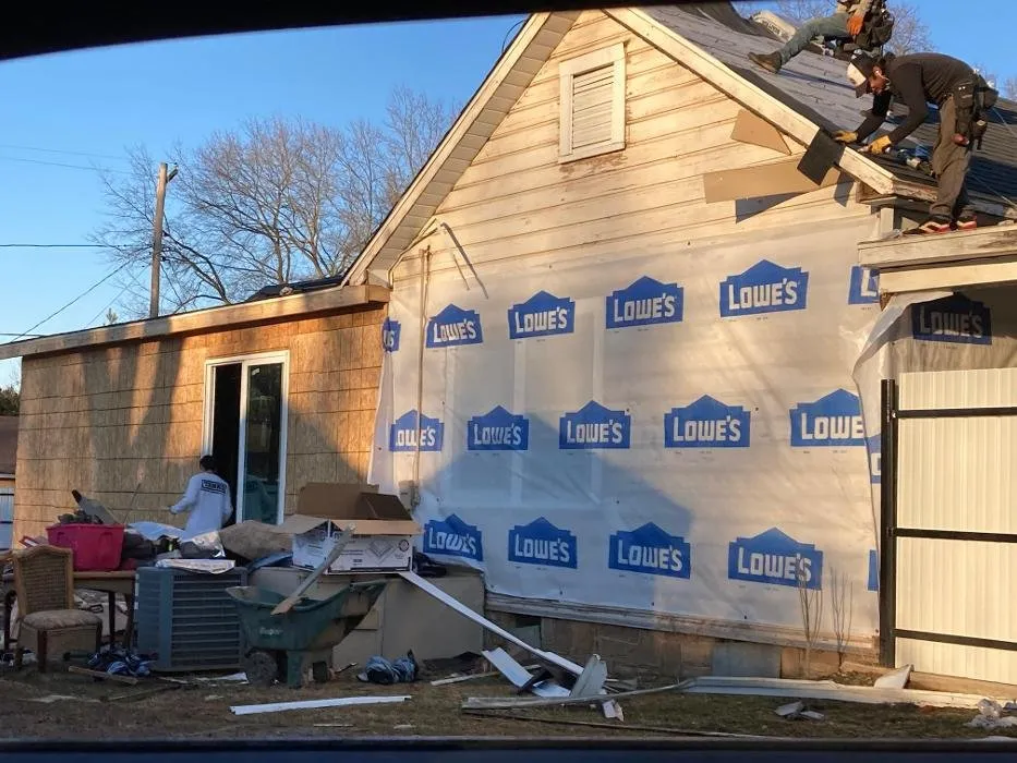 Slide of Top Notch Roofing