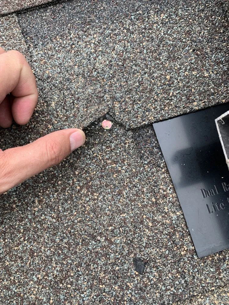 Slide of Top Notch Roofing