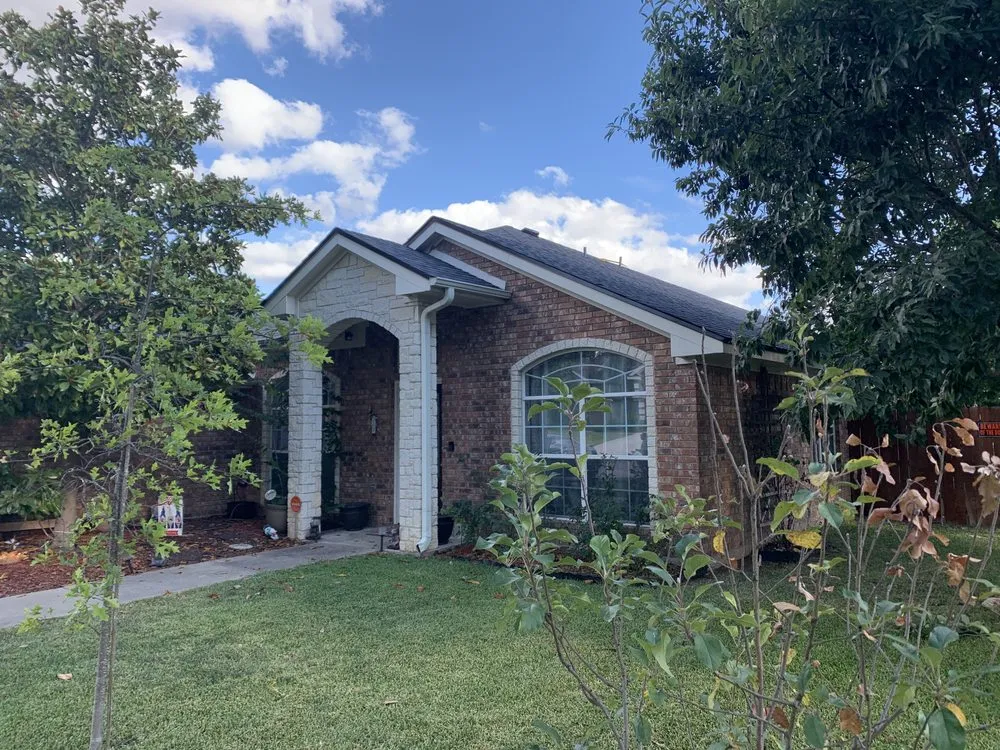 Slide of Top Notch Roofing