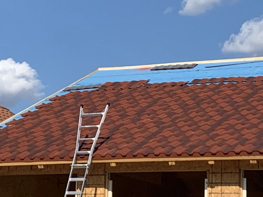 Slide of Top Notch Roofing