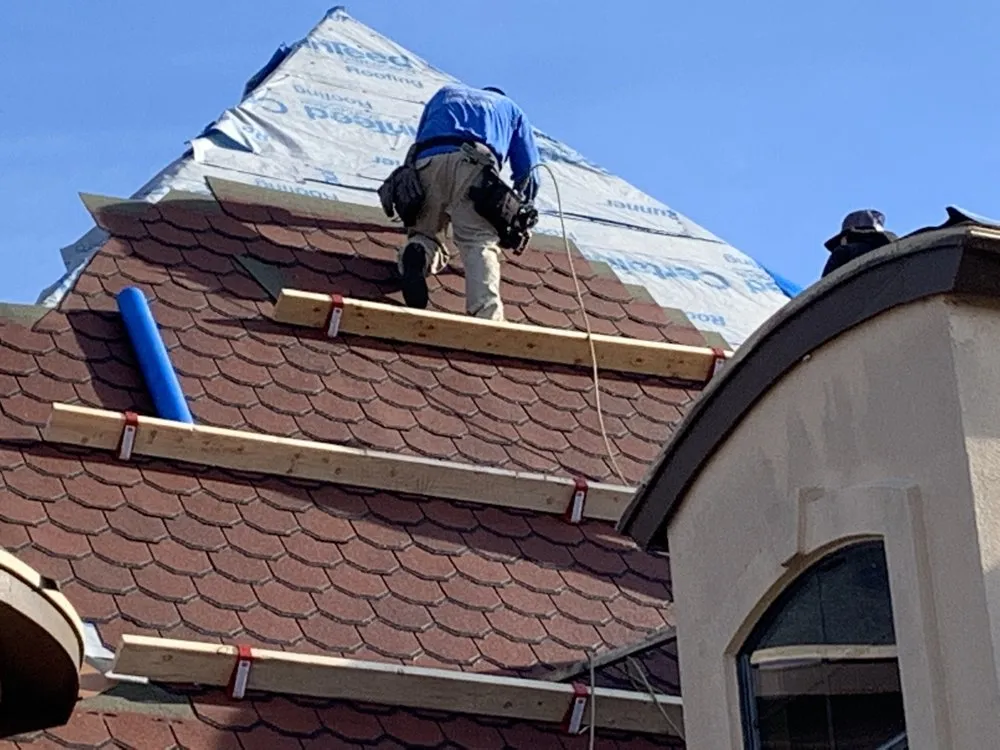 Slide of Top Notch Roofing