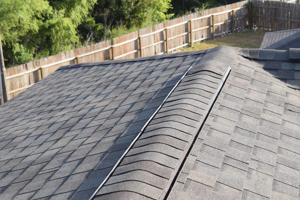 Slide of Top Notch Roofing