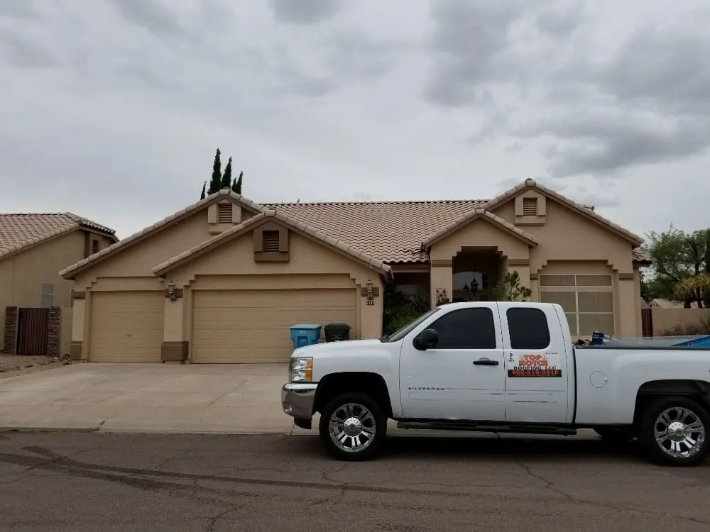 Slide of Top Notch Roofing