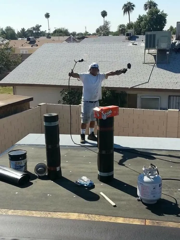 Slide of Top Notch Roofing