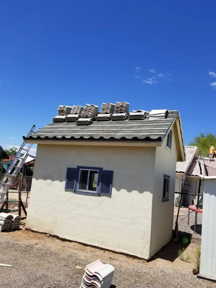 Slide of Top Notch Roofing