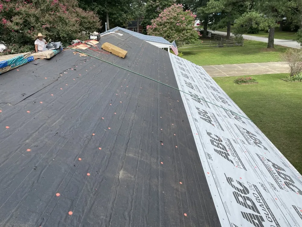 Slide of Top Notch Roofing