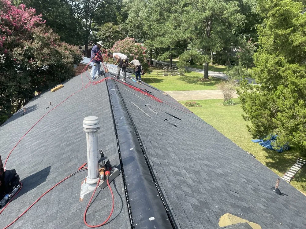 Slide of Top Notch Roofing