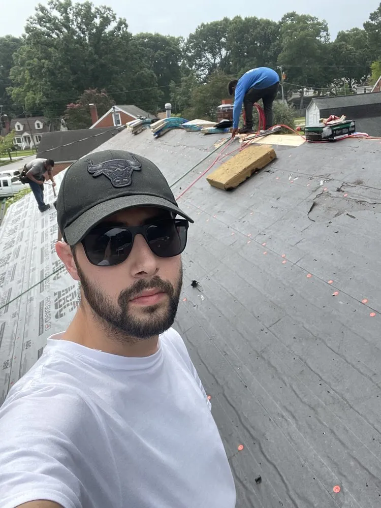 Slide of Top Notch Roofing