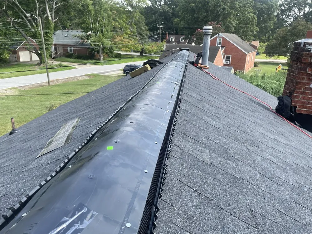 Slide of Top Notch Roofing