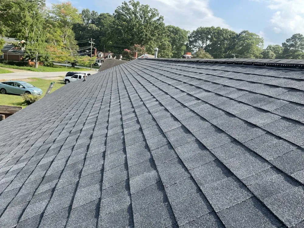 Slide of Top Notch Roofing