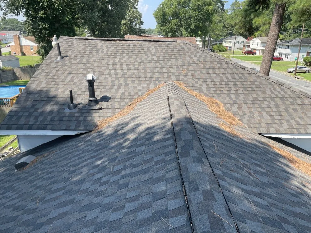 Slide of Top Notch Roofing