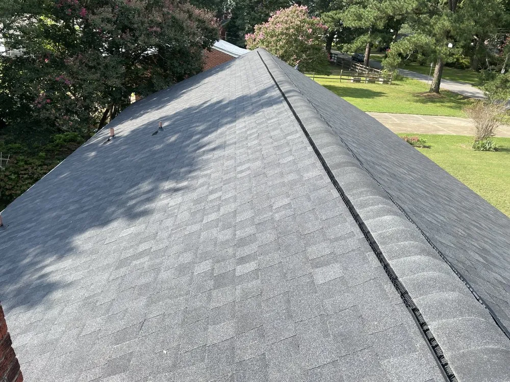 Slide of Top Notch Roofing