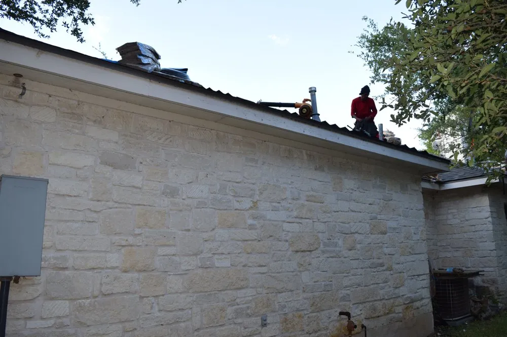 Slide of Top Notch Roofing